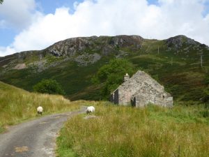 NN724282 Ruins at Glenmaik (2016). An abandoned cottage by the Allt Mathaig (Maik Burn), with Creag nan Eun ('crag of the birds') in the background. © Alan O'Dowd, Geograph