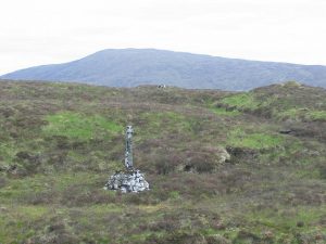 NN 26 61: could not quite read the monument's inscription from the path alongside the Allt an Inbhir. © Richard Webb, Geograph