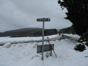 NO761915: ScotWays signpost with Slug Wood and the Slug Road beyond. This a view along the A957 from Stonehaven to Banchory, taken from the tiny car park at Spyhill Cottage in February 2010. © M J Richardson, Geograph