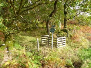 NN095603 looking N past the signs indicating the right of way to Lairigmor on the West Highland Way. Fort William is 10 miles this way and Kinlochleven seven (2017). © Oliver Dixon, Geograph