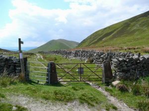 Dumfries and Galloway beyond the gate. Leaving Durisdeer on this track a sign says 2 miles to the Troloss March; this is two miles from Durisdeer and is a magnificent wall marking what is now the Regional Boundary, so I guess it is the Troloss March. © Gordon Brown, Geograph