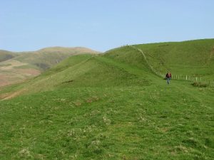 NS875058: on the footpath leading to the Enterkin Pass (2007). Heading north, high above the Enterkin Burn which is in the valley on the left of the photo. In the background are Thirstane Hill (583m) and East Mount Lowther (631m). © Eileen Henderson, Geograph