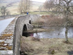 NN900367 bridge at Amulree (2006). This bridge took the A822 across the River Braan until 2010 when a new bridge was constructed to remove the bottleneck at Amulree. © Lis Burke, Geograph