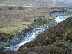 NN587983: looking south toward the footbridge over the Markie Burn. The path on the east side skirts the area of wet peat bog, and is not easy to follow in places. © Jim Barton, Geograph