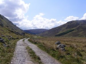 Looking SSE along the track to Stronelairg Lodge. Carn a' Choire Ghlaise on left and River Killin on right. Plantation can be seen on right. © Sarah McGuire, Geograph