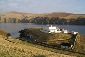 The Shore Station at Burrafirth was originally built in the late 19th century to house families of men working at the Muckle Flugga lighthouse. It now houses the Hermaness Visitor Centre and private residences. © Mike Pennington, Geograph