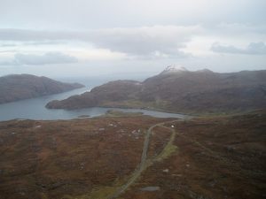 NB190079: looking SSE. The A859, its former alignment and the even earlier post road to Stornoway can all be seen clearly from left to right. Loch Seaforth and Todun are in the background. © Geograph, Mike Dunn