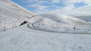 NT513574: the road to Tollishill after overnight snowfall in February 2010. Nothing like the one of January 5th that year which led to farmers being able to drive over their fences. © Richard Webb, Geograph