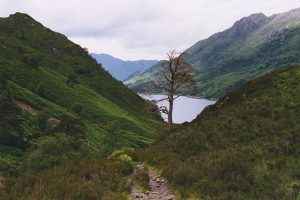 The Loch Hourn path here working its way around Creag Raonabhal, which blocks the direct route along the shore. © Nigel Brown, Geograph
