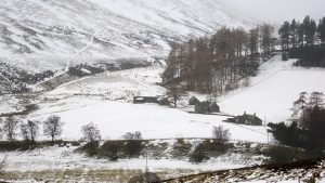 NO469718 looking SW to Waterhead, the last habitation in Glen Lethnot, still covered in snow, while every other dwelling in the glen was mostly snow free (9th February 2013). The old route to Afflochie can be seen ascending the hill behind. © Richard Webb, Geograph