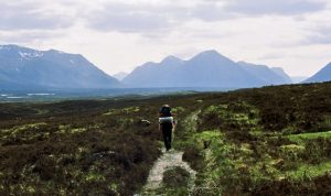 Striding across Rannoch Moor with Buachaille Etive Mor prominent in the distance. © Gordon Hatton, Geograph