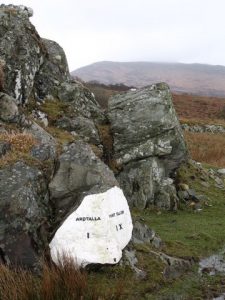 Milestone at Claggain Bay. © Gordon Hatton, Geograph