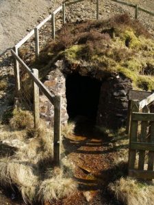  Hartfell Spa, the notice reads: 'Discovered in 1748 by John Williamson, whose memorial can be found in the Old Moffat Cemetery, the water from this spring contained Chalybeate, reputed to contain mainly iron and calcium deposits'. © Chris Eilbeck, Geograph