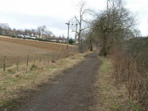 NS 703 779: looking east towards Balmalloch, Kilsyth, along the bed of a light railway line converted into a path. © Jim Bain, Geograph