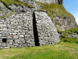 The groove running up the retaining wall held one of several masts used to suspend nets for drying. The niche to the left was used to hold oil lamps. Boats were winched up on to the level area in times of foul weather, and for repair. © Sylvia Duckworth, Geograph